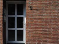 Kunststoff-Haustür weiß mit großem Glasanteil in Neuss
