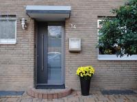 Haustür hell- und dunkelgrau mit Milchglas-Einsatz in Neuss-Weckhoven